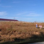 304_5-228 view of lot new with sign